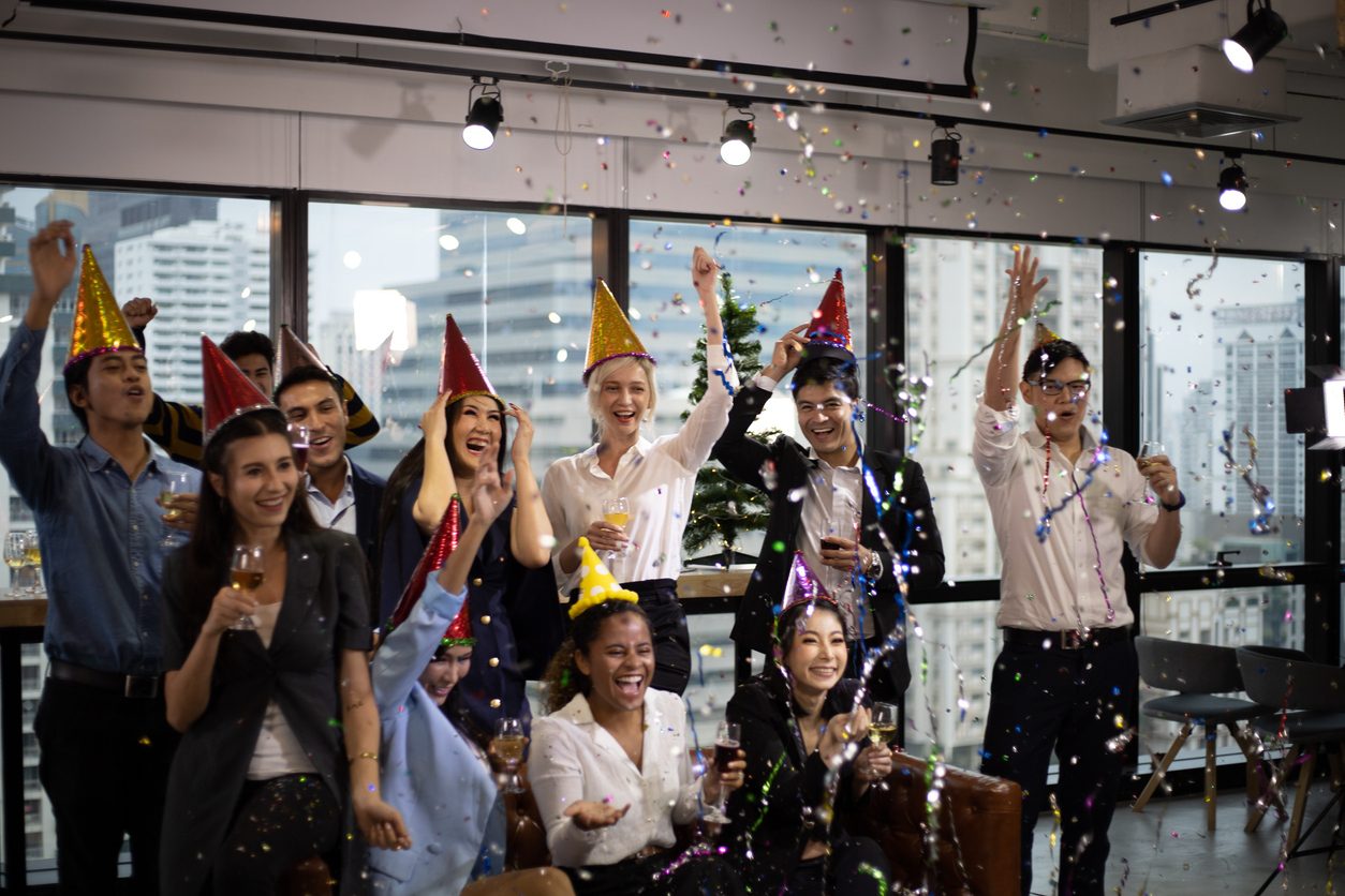 People in an office celebrating new years
