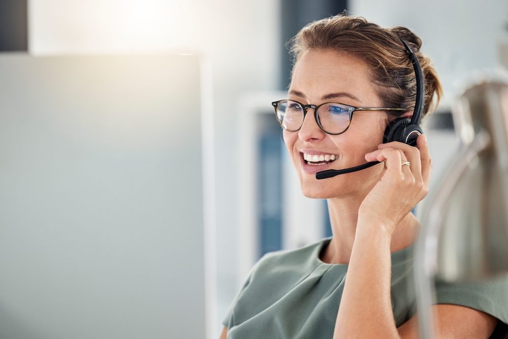 Call Center Worker With Headset Answering Call